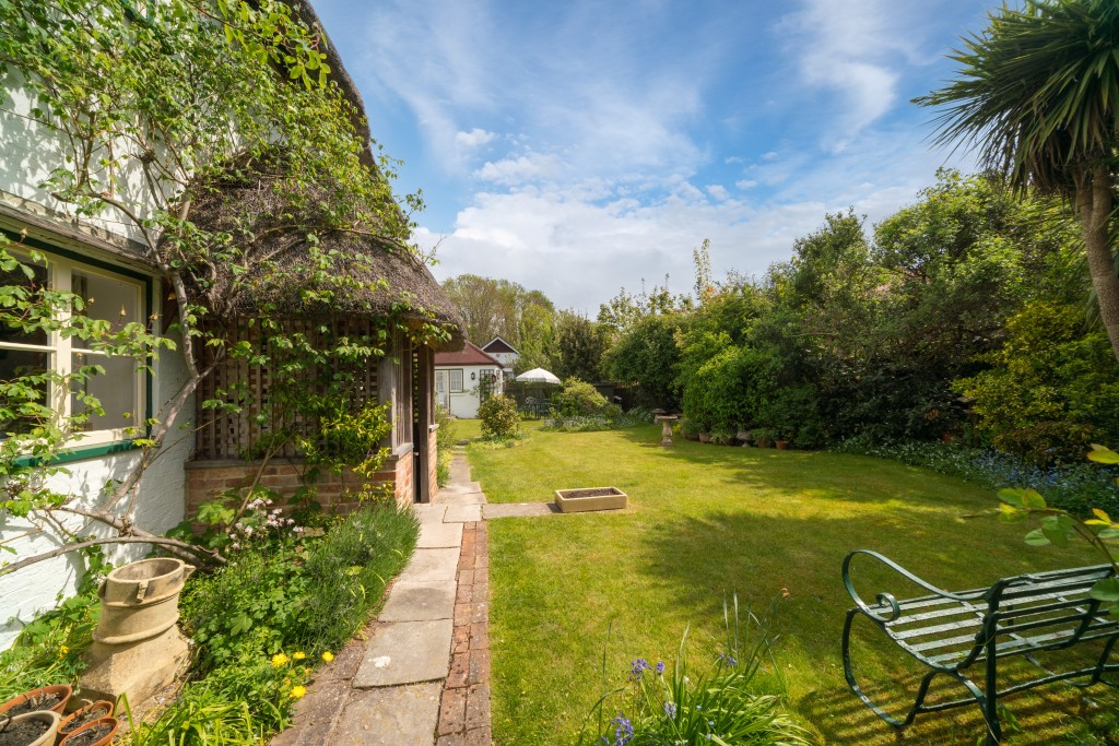 Lot: 108 - CHARMING COTTAGE WITH SELF-CONTAINED ANNEXE, GARDENS AND GARAGE - Gardens with lawn and path